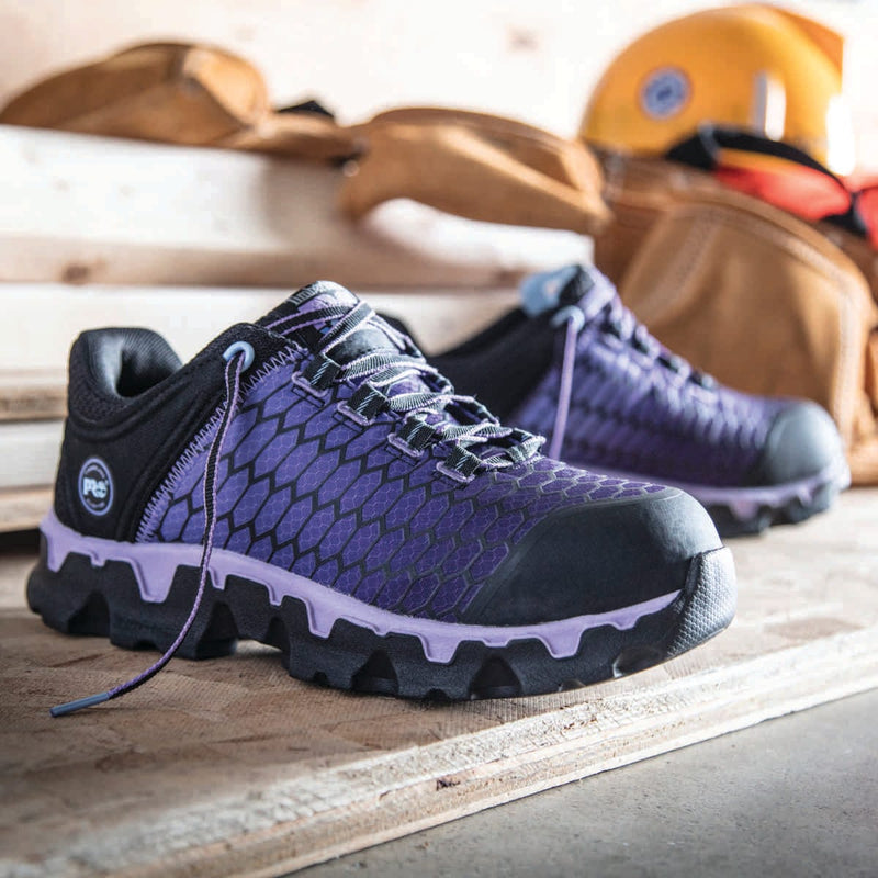 Timberland PRO Women's Powertrain Sport Work Shoes shown on a piece of lumber+++Timberland PRO Women's Powertrain Sport Work Shoes shown on a piece of lumber
