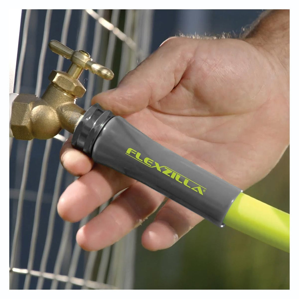 Flexzilla hose being connected to a water spout. High-quality connections for professional jobs. 