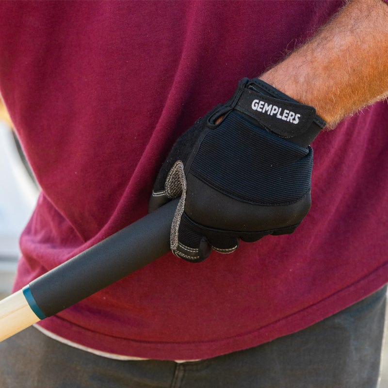 Gemplers Mechanics Glove in use as a landscaper works