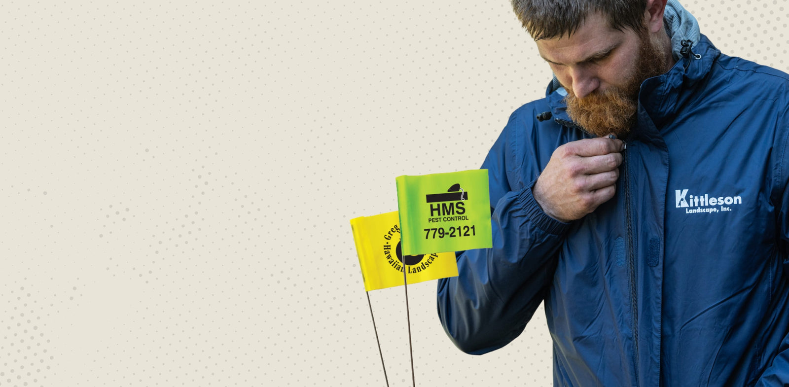 Add your logo at Gemplers. Customize your crew's gear & marking flags with Gemplers' customization. Image with marking flags featuring company logos and man zipping up a blue rain jacket with his company logo on it.