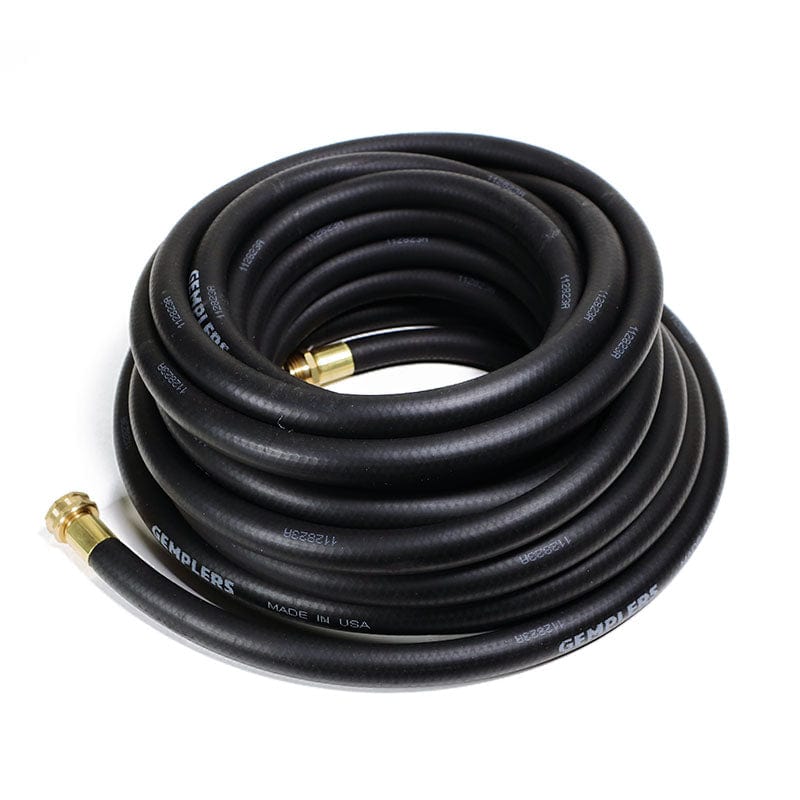 A coiled black rubber water hose with brass fittings.