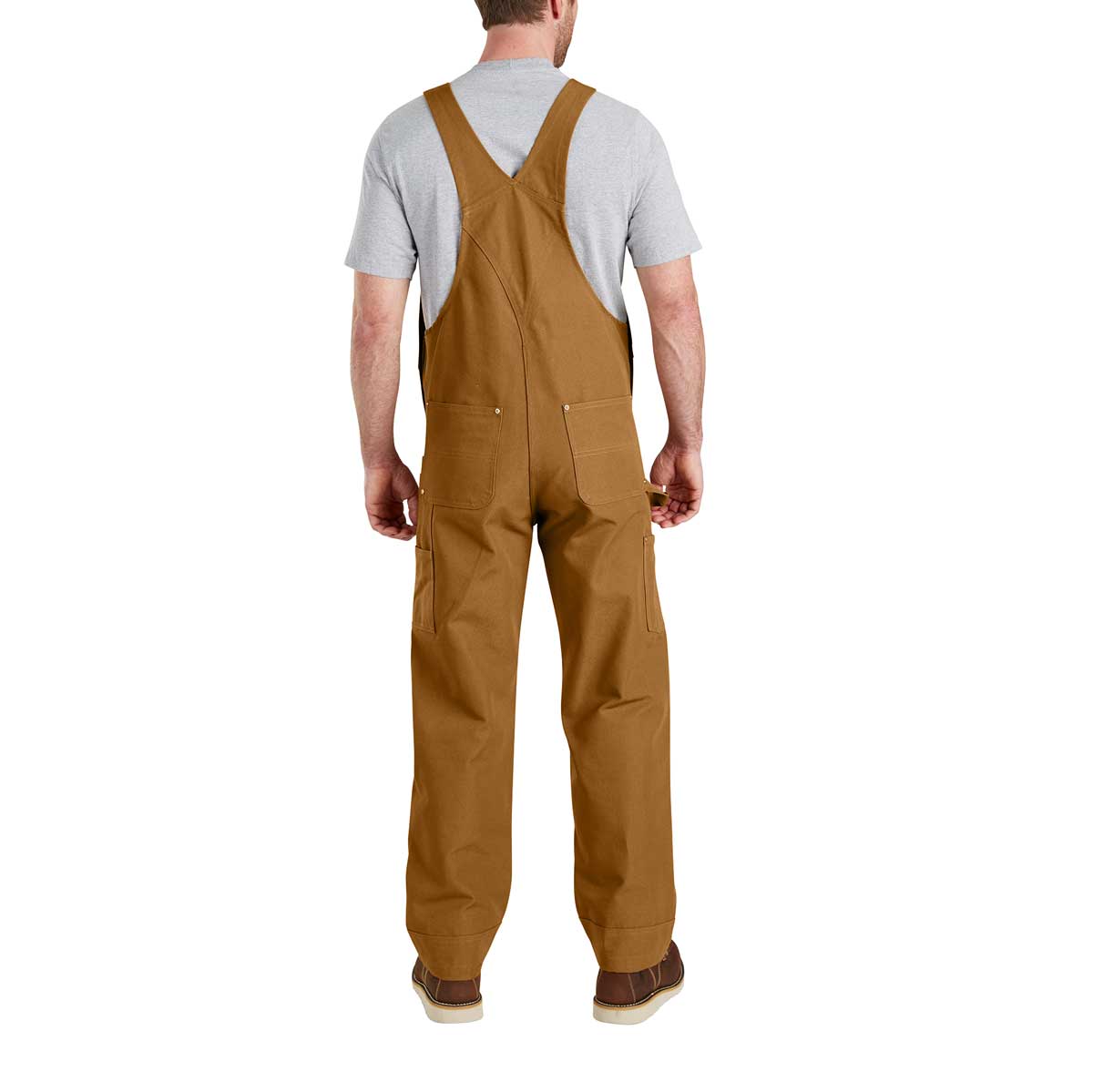 Back of Carhartt Men's Duck Bib Overall - Brown on model
