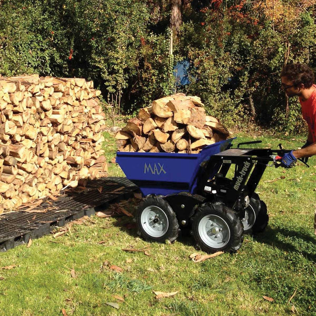 Max Truck By Muck-Truck hauling wood