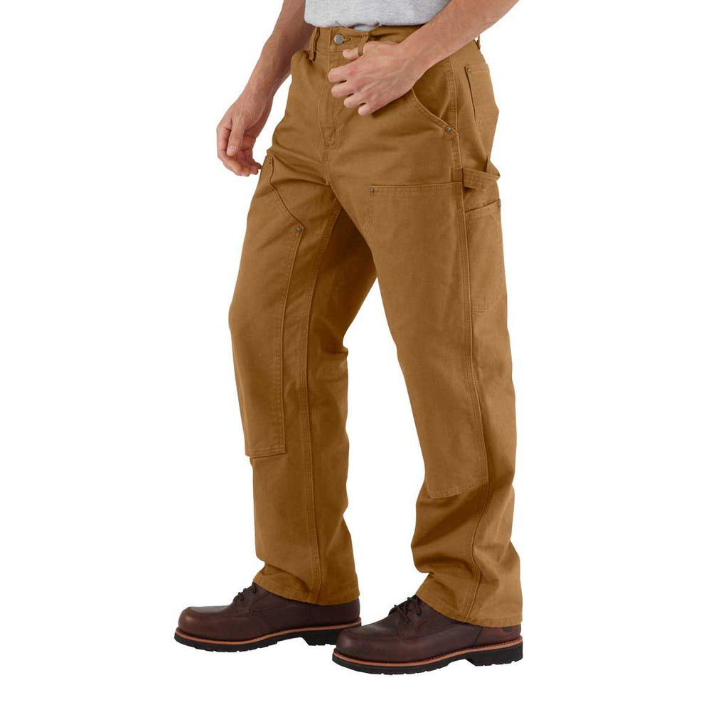 Left side of Carhartt Loose Fit Washed Duck Double-Front Utility Work Pant on model