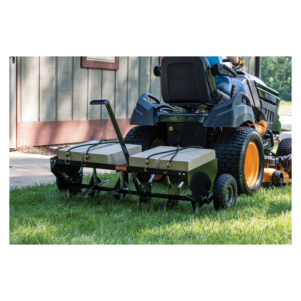 Closeup of Agri-Fab 40" Tow Plug Aerator 45-05183