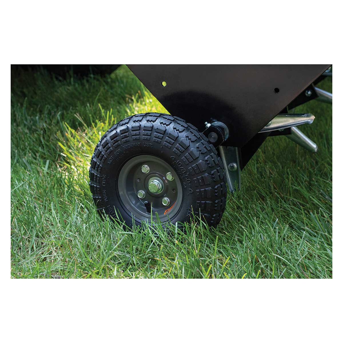 Closeup of the tire on a Agri-Fab 40" Tow Plug Aerator 45-05183