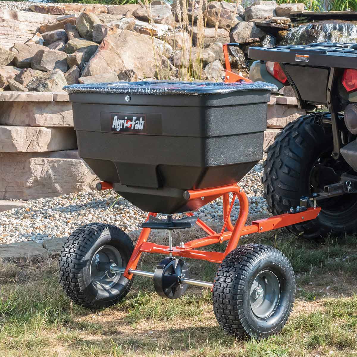 Agri-Fab 185 lb Tow Spreader - ATV Compatible In Use+++Agri-Fab 185 lb Tow Spreader - ATV Compatible In Use