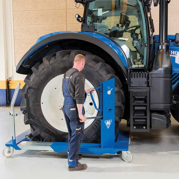 AME Low Profile Mega Tire Wheel Trolley - 1.5 Ton being used on a New Holland tractor