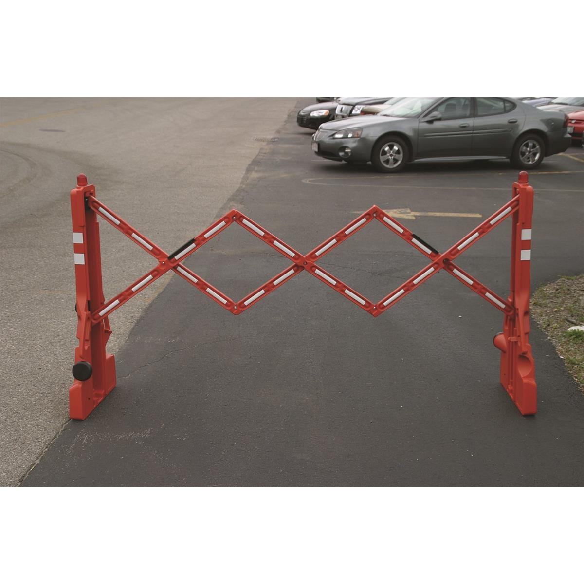 Adjust-A-Barricade with Flashing LED Lights set up in parking lot