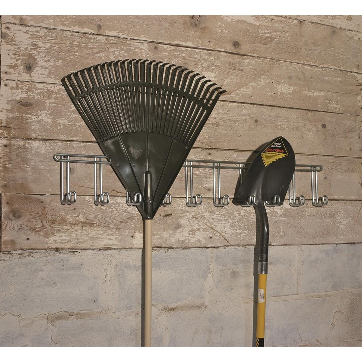 10-Hook Utility Rack with a shovel and poly rake