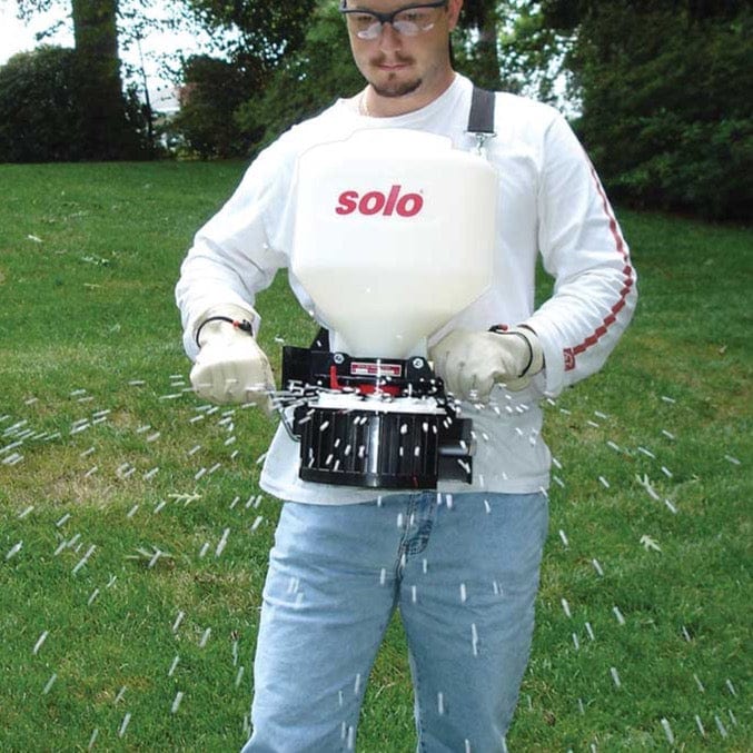 Solo 20 lb Portable Crank Spreader In Use+++Solo 20 lb Portable Crank Spreader In Use